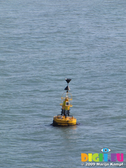 SX03111 Yellow bouy in sea Milford Haven